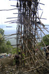 41 Vanuatu Saffolding, peopleexiting, ship in distance, Pentecost Island (photo by B.Cain)