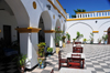 Stone Town, Zanzibar, Tanzania: al fresco tables and chequered floor - terrace of the Tembo hotel - Shangani - photo by M.Torres